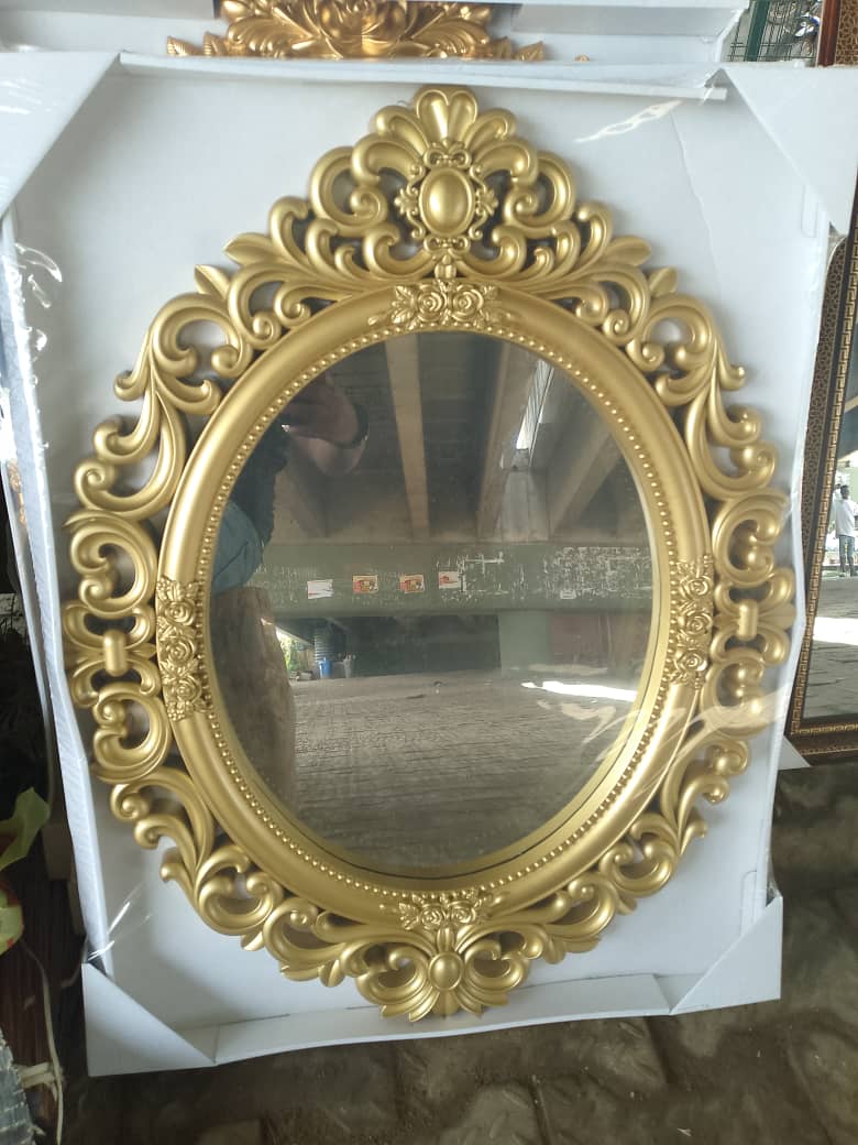 Imported frame mirror oval