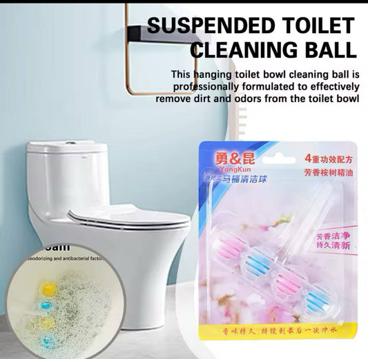 Suspended toilet cleaning ball